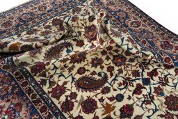 Surface texture of 1950s Najafabad rug with natural Wool and intricate pattern