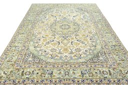 Surface texture of 2000s Najafabad rug with natural Wool and intricate pattern
