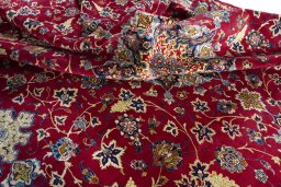 Surface texture of 2000s Najafabad rug with natural Wool and intricate pattern
