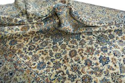 Surface texture of 2000s Najafabad rug with natural Wool and intricate pattern