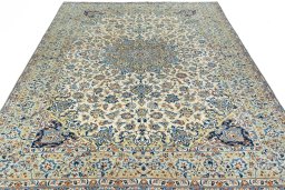 Surface texture of 2000s Najafabad rug with natural Wool and intricate pattern