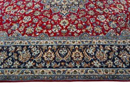 Corner detail of 2000s Najafabad rug showing border pattern and Wool pile