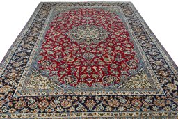 Surface texture of 2000s Najafabad rug with natural Wool and intricate pattern