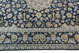 Corner detail of 2000s Najafabad rug showing border pattern and Wool pile