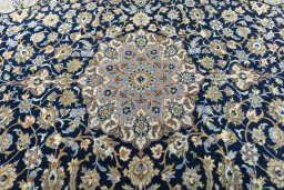 Central medallion detail of 2000s Najafabad rug from Iran / Persia
