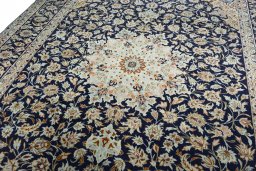Backside of handmade 2000s Najafabad rug showing knot structure and weave density