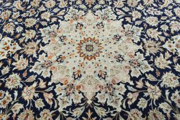 Central medallion detail of 2000s Najafabad rug from Iran / Persia