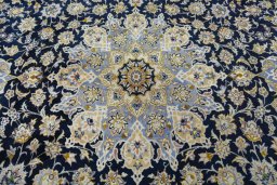 Central medallion detail of New Najafabad rug from Iran / Persia