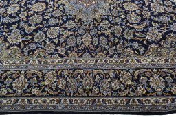 Corner detail of 2000s Najafabad rug showing border pattern and Wool pile