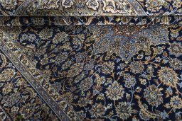 Close-up detail of 2000s Najafabad rug from Iran / Persia showing Wool weave