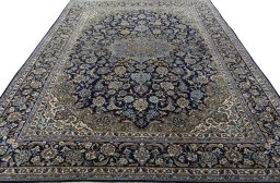 Surface texture of 2000s Najafabad rug with natural Wool and intricate pattern