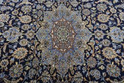Central medallion detail of 2000s Najafabad rug from Iran / Persia