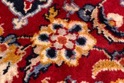 Backside of handmade 1990s Najafabad rug showing knot structure and weave density