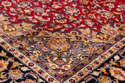 Backside of handmade 1990s Najafabad rug showing knot structure and weave density