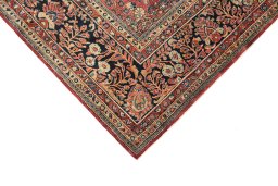 Backside of handmade 1920s Sarough rug showing knot structure and weave density