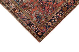 Backside of handmade 1920s Sarough rug showing knot structure and weave density