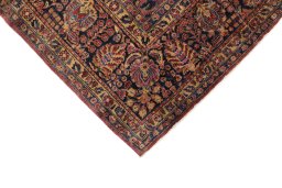 Backside of handmade 1900s Sarough rug showing knot structure and weave density