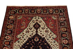 Surface texture of 1900s Sarough rug with natural Wool and intricate pattern