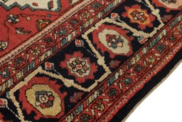 Close-up detail of 1900s Sarough rug from Iran / Persia showing Wool weave