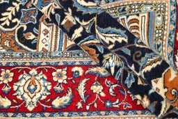 Corner detail of 1970s Sarough rug showing border pattern and Wool pile