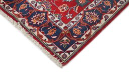 Backside of handmade New Sarough rug showing knot structure and weave density