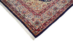 Backside of handmade New Sarough rug showing knot structure and weave density