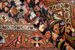 Corner detail of 1930s Sarough rug showing border pattern and Wool pile
