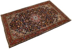 Corner detail of 1930s Sarough rug showing border pattern and Wool pile