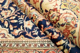 Corner detail of New Sarough rug showing border pattern and Wool pile