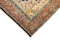 Backside of handmade New Sarough rug showing knot structure and weave density
