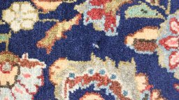 Close-up detail of 1960s Sarough rug from Iran / Persia showing Wool weave
