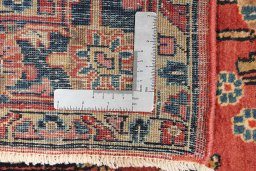 Corner detail of 1920s Sarough rug showing border pattern and Wool pile