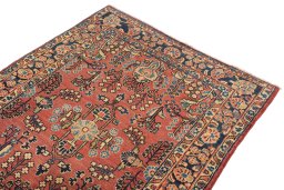 Surface texture of 1920s Sarough rug with natural Wool and intricate pattern