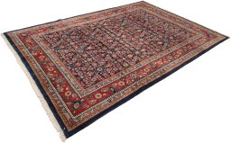 Close-up detail of 1950s Sarough rug from Iran / Persia showing Wool weave