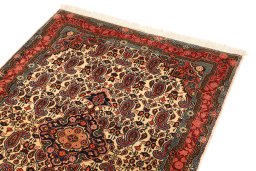 Backside of handmade 1930s Sarough rug showing knot structure and weave density