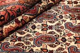 Close-up detail of 1930s Sarough rug from Iran / Persia showing Wool weave