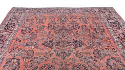 Surface texture of 1910s Sarough rug with natural Wool and intricate pattern