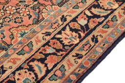 Backside of handmade 1930s Sarough rug showing knot structure and weave density