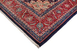 Backside of handmade 1990s Sarough rug showing knot structure and weave density