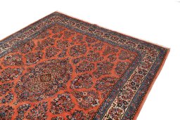 Surface texture of 1990s Sarough rug with natural Wool and intricate pattern