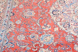 Corner detail of 2000s Sarough rug showing border pattern and Cork pile