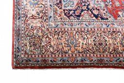 Corner detail of 2000s Sarough rug showing border pattern and Cork pile
