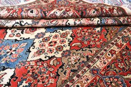 Full view of 2000s Sarough rug from Iran / Persia, 382 × 267 cm in Multi Color tones