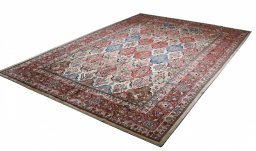 Close-up detail of 2000s Sarough rug from Iran / Persia showing Wool weave