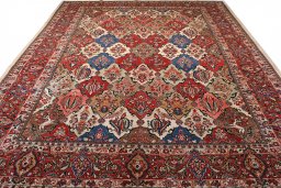 Surface texture of 2000s Sarough rug with natural Wool and intricate pattern