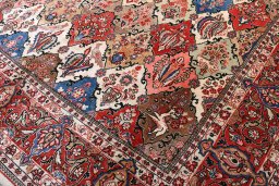 Close-up detail of 2000s Sarough rug from Iran / Persia showing Wool weave