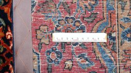 Corner detail of 1930s Sarough rug showing border pattern and Cork pile