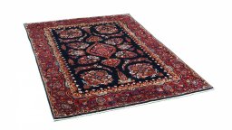 Corner detail of 1930s Sarough rug showing border pattern and Cork pile