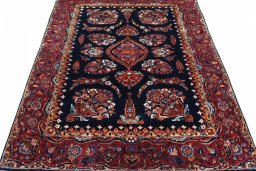 Surface texture of 1930s Sarough rug with natural Cork and intricate pattern
