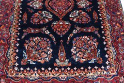 Backside of handmade 1930s Sarough rug showing knot structure and weave density